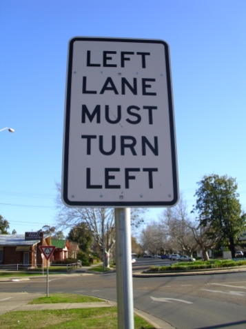 left_lane_must_turn_left_sign_located_at_the_ivan_jack_drive2c_trail_and_johnston_street_roundabout